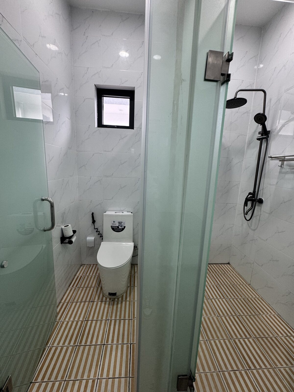 Twin room private bathroom with separate shower